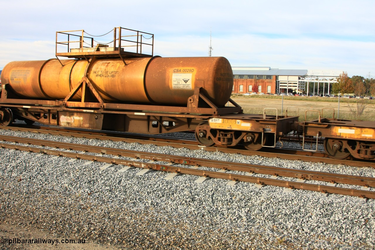 100611 0315
Midland, AQHY 30005 with sulphuric acid tank CSA 0029, originally built by the WAGR Midland Workshops in 1964/66 at WF type flat waggons, then following several codes and modifications in 1997 seventy five were converted to WQH to carry CSA sulphuric acid tanks between Hampton/Kalgoorlie and Perth/Kwinana.
Keywords: AQHY-type;AQHY30005;WAGR-Midland-WS;WF-type;WFDY-type;WFDF-type;RFDF-type;WQH-type;