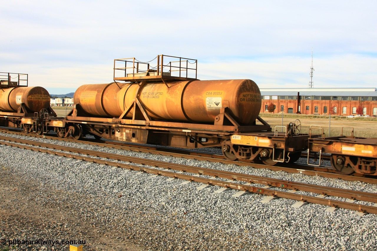 100611 0317
Midland, AQHY 30040 with sulphuric acid tank CSA 0022, originally built by the WAGR Midland Workshops in 1964/66 at WF type flat waggons, then following several codes and modifications in 1997 seventy five were converted to WQH to carry CSA sulphuric acid tanks between Hampton/Kalgoorlie and Perth/Kwinana.
Keywords: AQHY-type;AQHY30040;WAGR-Midland-WS;WF-type;WFDY-type;WFDF-type;WQH-type;