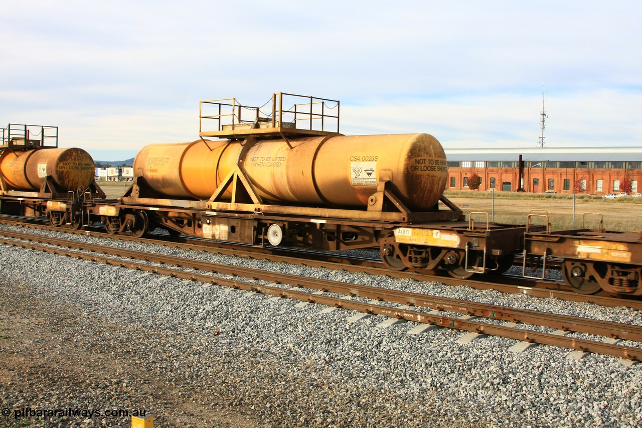 100611 0320
Midland, AQHY 30025 with sulphuric acid tank CSA 0023, originally built by the WAGR Midland Workshops in 1964/66 at WF type flat waggons, then following several codes and modifications in 1997 seventy five were converted to WQH to carry CSA sulphuric acid tanks between Hampton/Kalgoorlie and Perth/Kwinana.
Keywords: AQHY-type;AQHY30025;WAGR-Midland-WS;WF-type;WMA-type;WFDY-type;WFDF-type;RFDF-type;WQH-type;