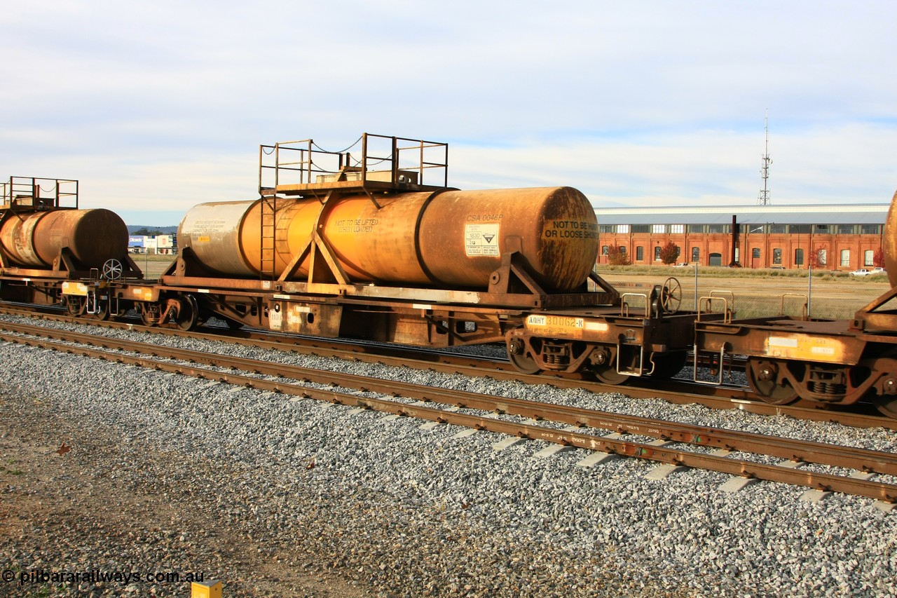 100611 0321
Midland, AQHY 30062 with sulphuric acid tank CSA 0046, originally built by the WAGR Midland Workshops in 1964/66 at WF type flat waggons, then following several codes and modifications in 1997 seventy five were converted to WQH to carry CSA sulphuric acid tanks between Hampton/Kalgoorlie and Perth/Kwinana.
Keywords: AQHY-type;AQHY30062;WAGR-Midland-WS;WF-type;WFDY-type;WFDF-type;RFDF-type;WQH-type;