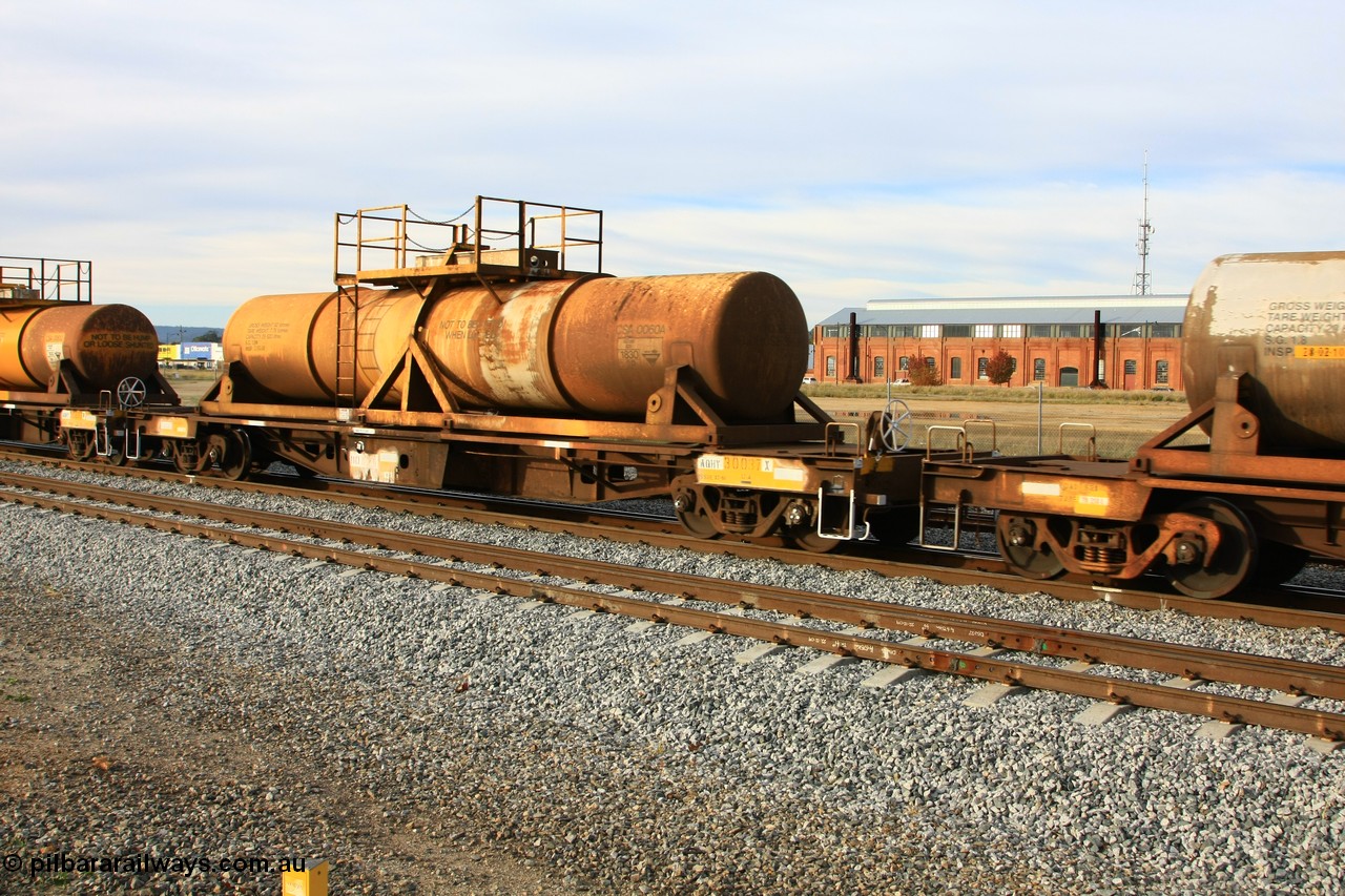 100611 0322
Midland, AQHY 30037 with sulphuric acid tank CSA 0060, originally built by the WAGR Midland Workshops in 1964/66 at WF type flat waggons, then following several codes and modifications in 1997 seventy five were converted to WQH to carry CSA sulphuric acid tanks between Hampton/Kalgoorlie and Perth/Kwinana.
Keywords: AQHY-type;AQHY30037;WAGR-Midland-WS;WF-type;WMA-type;WFDY-type;WFDF-type;RFDF-type;WQH-type;