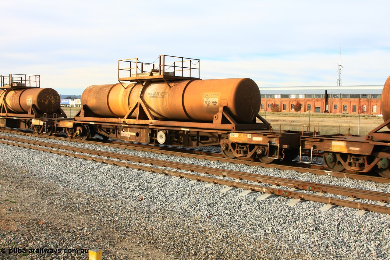 100611 0325
Midland, AQHY 30117 with sulphuric acid tank CSA 0025, originally built by the WAGR Midland Workshops in 1964/66 at WF type flat waggons, then following several codes and modifications in 1997 seventy five were converted to WQH to carry CSA sulphuric acid tanks between Hampton/Kalgoorlie and Perth/Kwinana.
Keywords: AQHY-type;AQHY30117;WAGR-Midland-WS;WF-type;WFDY-type;WFDF-type;RFDF-type;WQH-type;