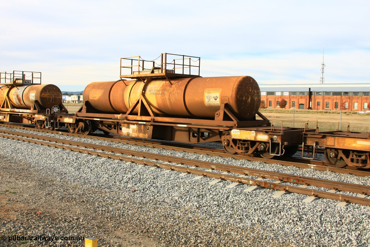 100611 0326
Midland, AQHY 30038 with sulphuric acid tank CSA 0012, originally built by the WAGR Midland Workshops in 1964/66 at WF type flat waggons, then following several codes and modifications in 1997 seventy five were converted to WQH to carry CSA sulphuric acid tanks between Hampton/Kalgoorlie and Perth/Kwinana.
Keywords: AQHY-type;AQHY30038;WAGR-Midland-WS;WF-type;WFP-type;WFDY-type;WFDF-type;RFDF-type;WQH-type;