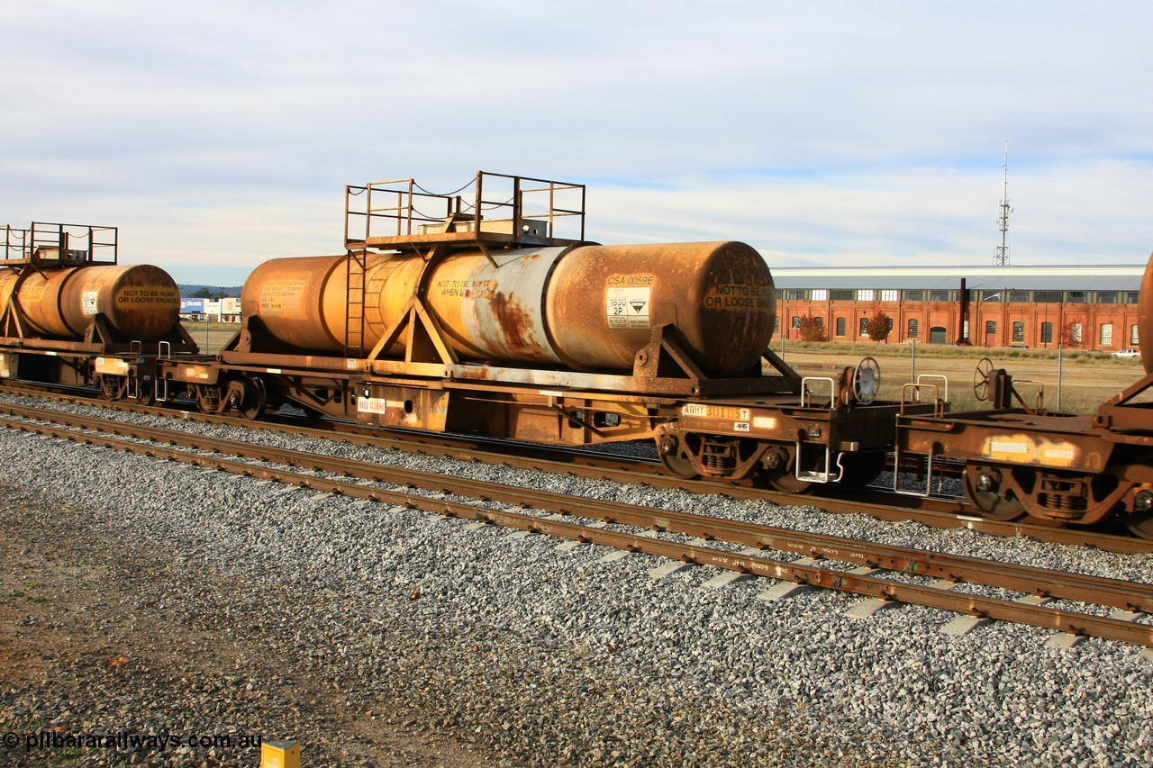 100611 0327
Midland, AQHY 30105 with sulphuric acid tank CSA 0059, originally built by the WAGR Midland Workshops in 1964/66 at WF type flat waggons, then following several codes and modifications in 1997 seventy five were converted to WQH to carry CSA sulphuric acid tanks between Hampton/Kalgoorlie and Perth/Kwinana.
Keywords: AQHY-type;AQHY30105;WAGR-Midland-WS;WF-type;WFP-type;WFDY-type;WFDF-type;RFDF-type;WQH-type;