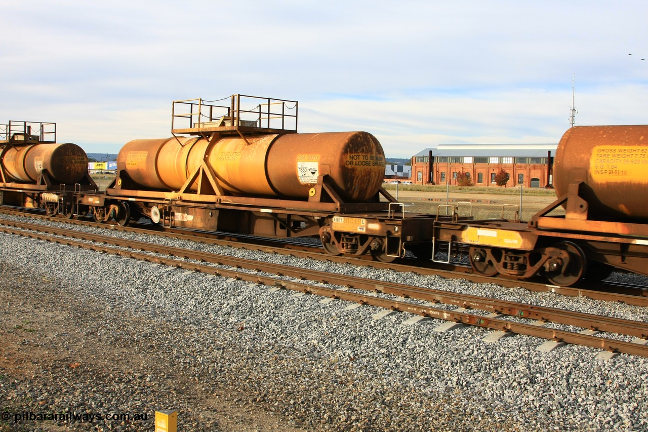 100611 0329
Midland, AQHY 30049 with sulphuric acid tank CSA 0031, originally built by the WAGR Midland Workshops in 1964/66 at WF type flat waggons, then following several codes and modifications in 1997 seventy five were converted to WQH to carry CSA sulphuric acid tanks between Hampton/Kalgoorlie and Perth/Kwinana.
Keywords: AQHY-type;AQHY30049;WAGR-Midland-WS;WF-type;WFDY-type;WFDF-type;RFDF-type;WQH-type;