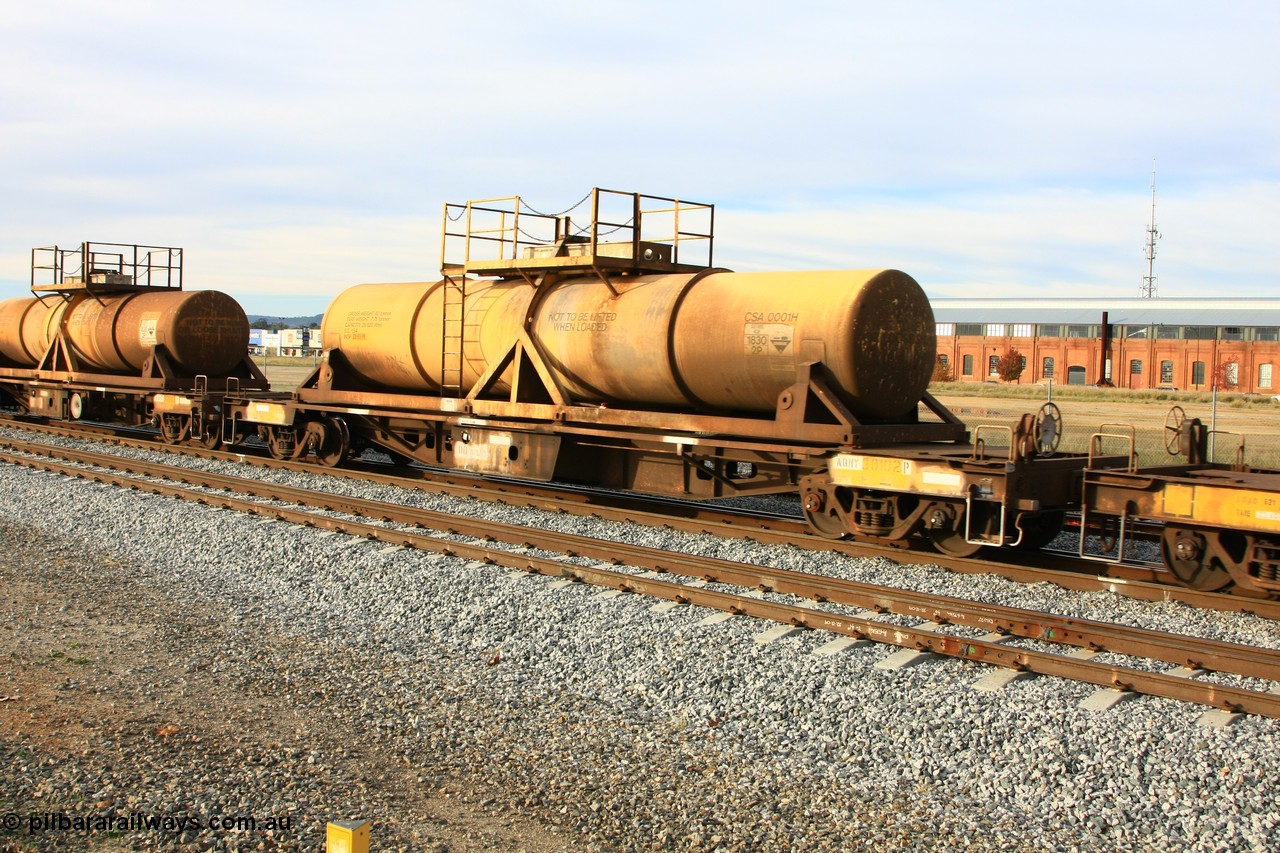 100611 0333
Midland, AQHY 30102 with sulphuric acid tank CSA 0001, originally built by the WAGR Midland Workshops in 1964/66 at WF type flat waggons, then following several codes and modifications in 1997 seventy five were converted to WQH to carry CSA sulphuric acid tanks between Hampton/Kalgoorlie and Perth/Kwinana.
Keywords: AQHY-type;AQHY30102;WAGR-Midland-WS;WF-type;WFDY-type;WFDF-type;RFDF-type;WQH-type;