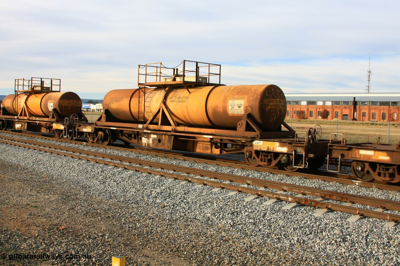 100611 0335
Midland, AQHY 30026 with sulphuric acid tank CSA 0058, originally built by the WAGR Midland Workshops in 1964/66 at WF type flat waggons, then following several codes and modifications in 1997 seventy five were converted to WQH to carry CSA sulphuric acid tanks between Hampton/Kalgoorlie and Perth/Kwinana.
Keywords: AQHY-type;AQHY30026;WAGR-Midland-WS;WF-type;WFW-type;WFDY-type;WFDF-type;RFDF-type;WQH-type;