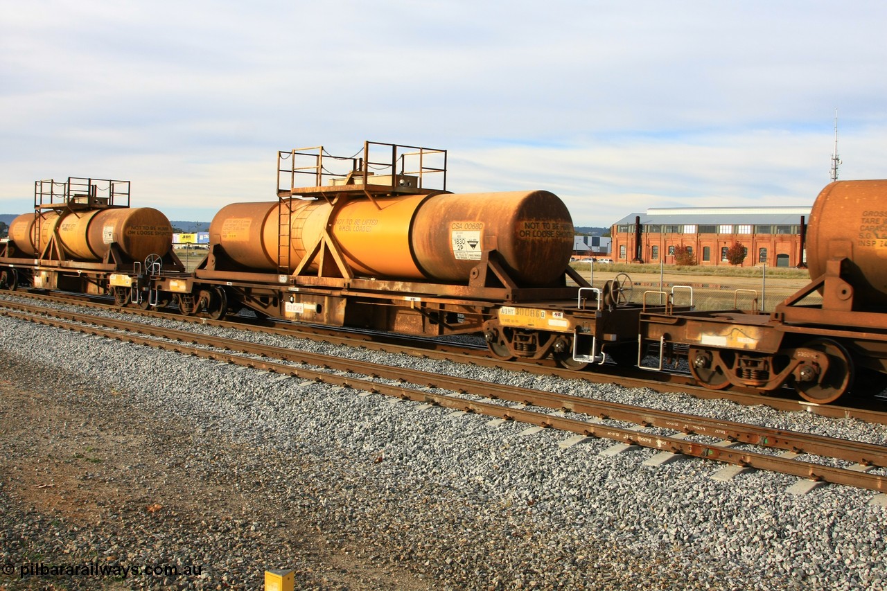 100611 0336
Midland, AQHY 30086 with sulphuric acid tank CSA 0068, originally built by the WAGR Midland Workshops in 1964/66 at WF type flat waggons, then following several codes and modifications in 1997 seventy five were converted to WQH to carry CSA sulphuric acid tanks between Hampton/Kalgoorlie and Perth/Kwinana.
Keywords: AQHY-type;AQHY30086;WAGR-Midland-WS;WF-type;WFP-type;WFDY-type;WFDF-type;RFDF-type;WQH-type;