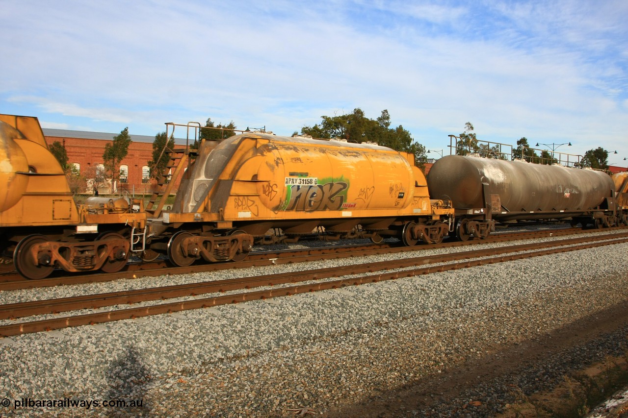 100611 0350
Midland, APNY 31158 one of twelve built by WAGR Midland Workshops in 1974 as WNA type pneumatic discharge nickel concentrate waggon, WAGR built and owned copies of the AE Goodwin built WN waggons for WMC.
Keywords: APNY-type;APNY31158;WAGR-Midland-WS;WNA-type;