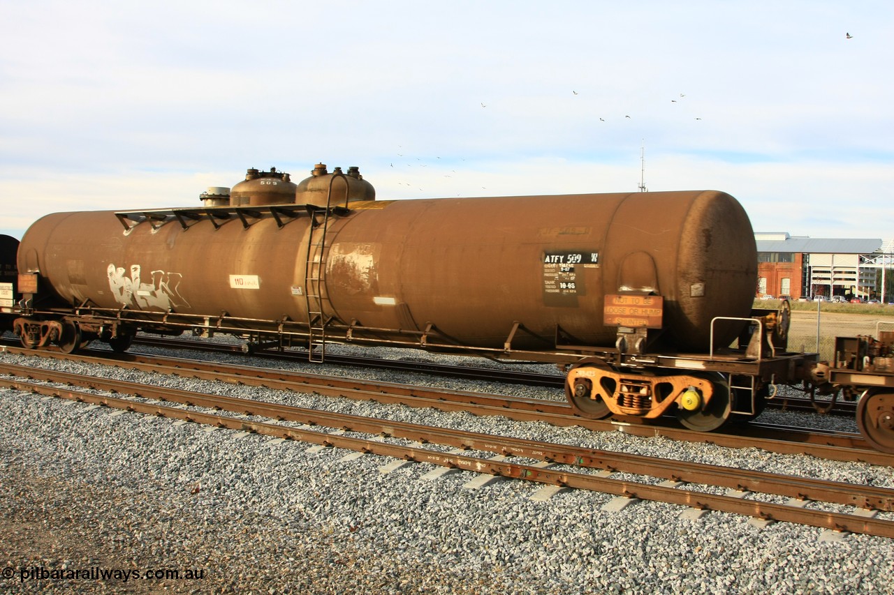 100611 0370
Midland, ATFY 509 fuel tank waggon built by Tulloch Ltd NSW in 1970 for Mobil WA as a WJF type, 96.24 kilolitres, 1 compartment and 2 domes. Recoded to WJFY, sold to BP Oil in 1985.
Keywords: ATFY-type;ATFY509;Tulloch-Ltd-NSW;WJF-type;WJFY-type;