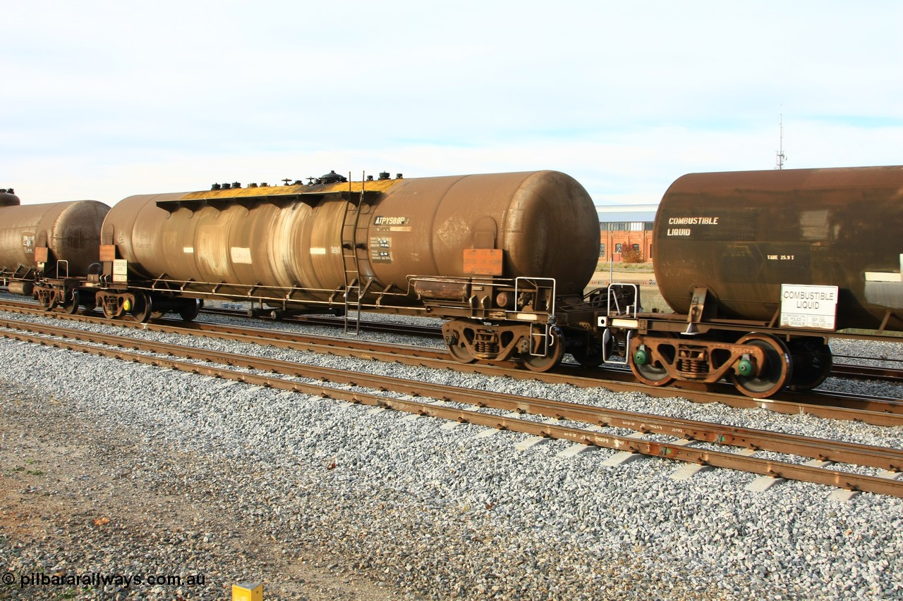 100611 0381
Midland, ATPY 588 fuel tank waggon, built by Westrail Midland Workshops in 1979 for Mobil as WJP type 80,000 litre single compartment and dome, recoded to WJPY, sold to BP Oil in 1985.
Keywords: ATPY-type;ATPY588;WAGR-Midland-WS;WJP-type;WJPY-type;