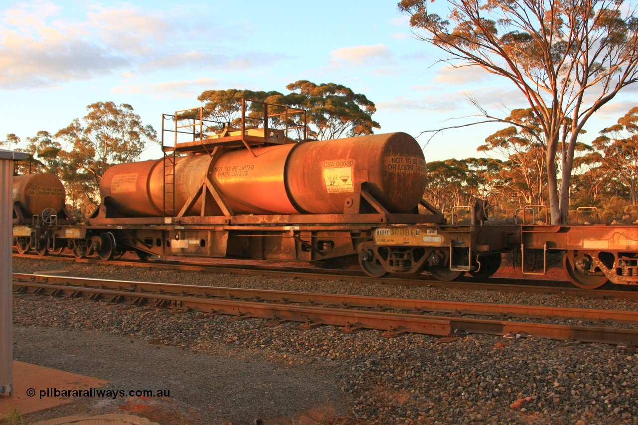 100731 3221
Binduli, AQHY 30086 with sulphuric acid tank CSA 0068, originally built by the WAGR Midland Workshops in 1964/66 at WF type flat waggons, then following several codes and modifications in 1997 seventy five were converted to WQH to carry CSA sulphuric acid tanks between Hampton/Kalgoorlie and Perth/Kwinana.
Keywords: AQHY-type;AQHY30086;WAGR-Midland-WS;WF-type;WFP-type;WFDY-type;WFDF-type;RFDF-type;WQH-type;