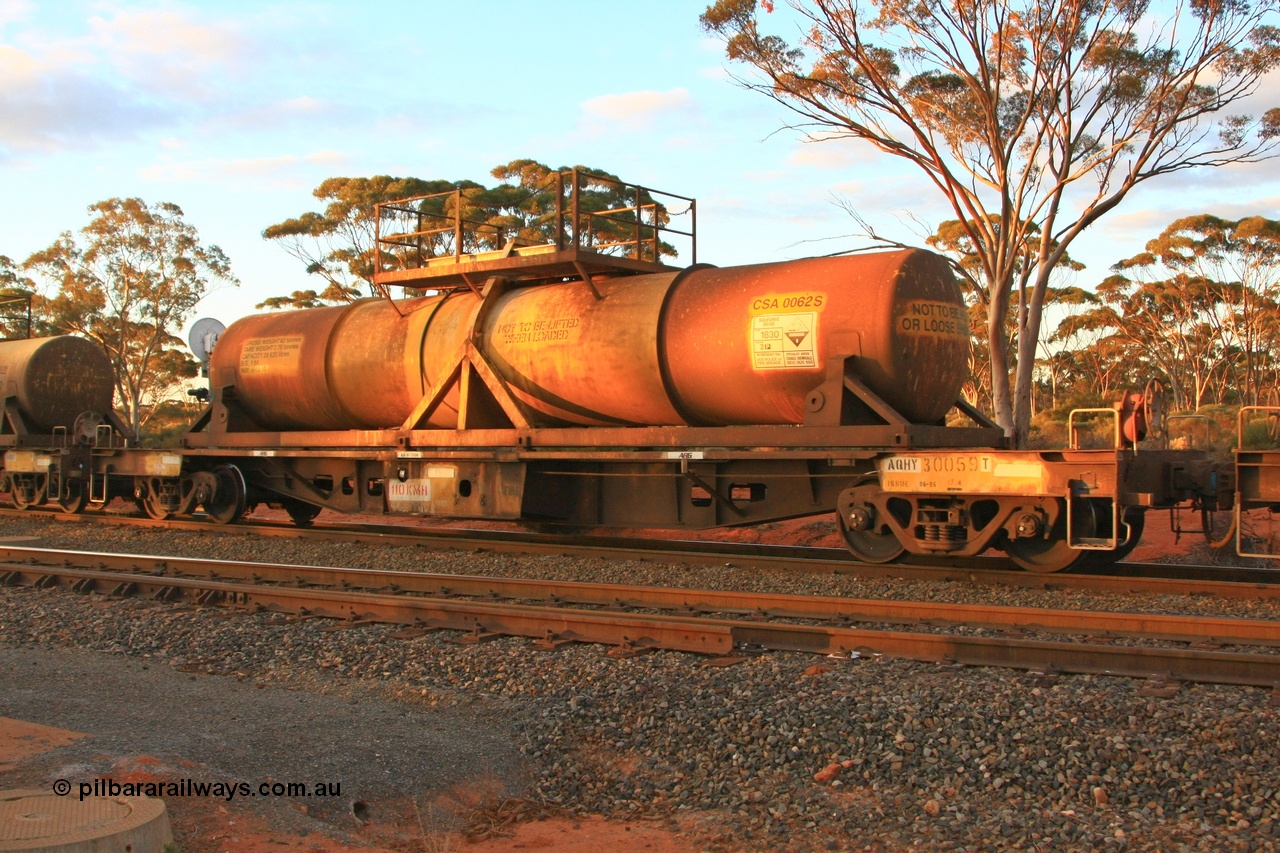 100731 3225
Binduli, AQHY 30059 with sulphuric acid tank CSA 0062, originally built by the WAGR Midland Workshops in 1964/66 at WF type flat waggons, then following several codes and modifications in 1997 seventy five were converted to WQH to carry CSA sulphuric acid tanks between Hampton/Kalgoorlie and Perth/Kwinana.
Keywords: AQHY-type;AQHY30059;WAGR-Midland-WS;WF-type;WFL-type;WFDY-type;WFDF-type;RFDF-type;WQH-type;