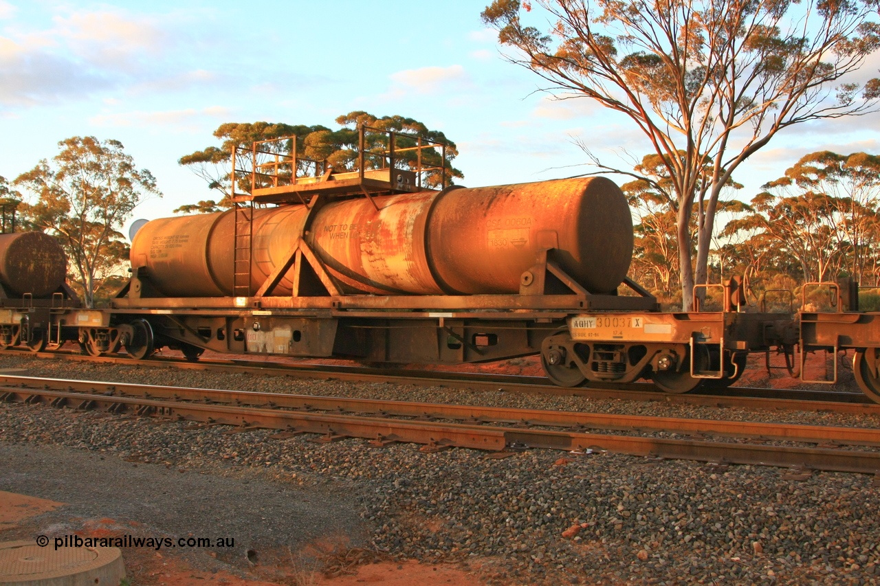 100731 3231
Binduli, AQHY 30037 with sulphuric acid tank CSA 0060, originally built by the WAGR Midland Workshops in 1964/66 at WF type flat waggons, then following several codes and modifications in 1997 seventy five were converted to WQH to carry CSA sulphuric acid tanks between Hampton/Kalgoorlie and Perth/Kwinana.
Keywords: AQHY-type;AQHY30037;WAGR-Midland-WS;WF-type;WMA-type;WFDY-type;WFDF-type;RFDF-type;WQH-type;