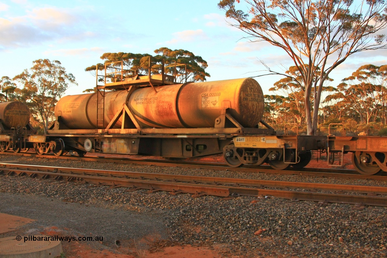 100731 3245
Binduli, AQHY 30097 with sulphuric acid tank CSA 0008, originally built by the WAGR Midland Workshops in 1964/66 at WF type flat waggons, then following several codes and modifications in 1997 seventy five were converted to WQH to carry CSA sulphuric acid tanks between Hampton/Kalgoorlie and Perth/Kwinana.
Keywords: AQHY-type;AQHY30097;WAGR-Midland-WS;WF-type;WFP-type;WFDY-type;WFDF-type;RFDF-type;WQH-type;