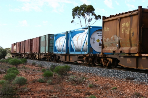 060117 2715
Bardoc, AQNY type container waggons, four of sixty two waggons built by Goninan WA in 1998 as WQN type for Murrin Murrin container traffic, with 20' containers, tank tainers and a sulphur skip, train 2029 loaded Malcolm freighter.
Keywords: AQNY-type;Goninan-WA;WQN-type;