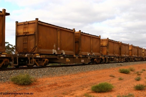 060527 4104
Scotia, AQNY 32166, one of sixty two waggons built by Goninan WA in 1998 as WQN type for Murrin Murrin container traffic, with sulphur skips S83S and S14R both with original style doors and sliding tarpaulins, train 6029 loaded Malcolm freighter.
Keywords: AQNY-type;AQNY32166;Goninan-WA;WQN-type;