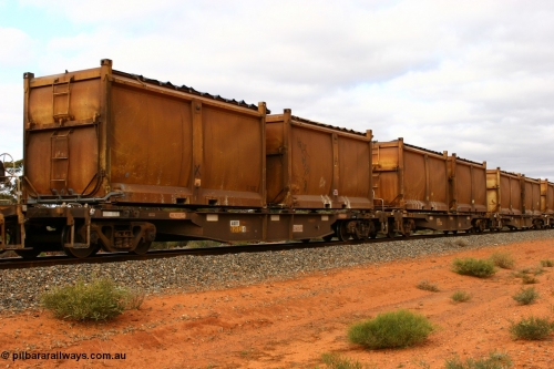 060527 4105
Scotia, AQNY 32173, one of sixty two waggons built by Goninan WA in 1998 as WQN type for Murrin Murrin container traffic, with sulphur skips S10E and S107U both with original style doors and sliding tarpaulins, train 6029 loaded Malcolm freighter.
Keywords: AQNY-type;AQNY32173;Goninan-WA;WQN-type;