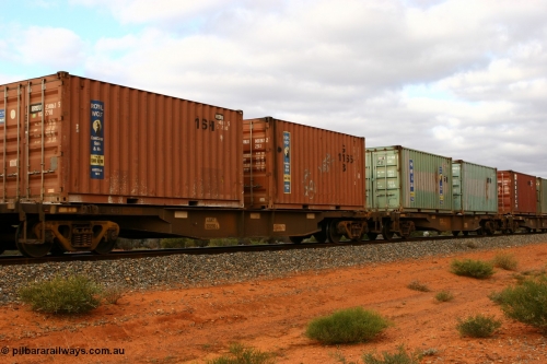 060527 4115
Scotia, AQNY 32200, one of sixty two waggons built by Goninan WA in 1998 as WQN type for Murrin Murrin container traffic, with two Royal Wolf 20' containers RRDU 234861 and RWLU 800387, train 6029 loaded Malcolm freighter.
Keywords: AQNY-type;AQNY32200;Goninan-WA;WQN-type;