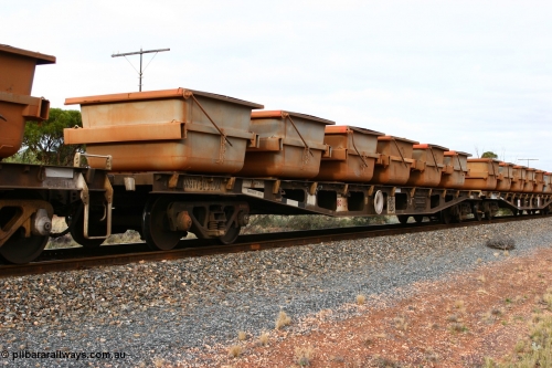 060527 4136
Scotia, WQTY 30309 flat waggon, originally built by Tomlinson Steel WA as WFX type in 1969 from a batch of one hundred and sixty one waggons, recoded to WQCX type in 1980, then WQC type before recoded back the WQCX in 1981, then to RQHX in 1994, to current code in 1996. Seen here carrying six loaded nickel ore kibbles.
Keywords: WQTY-type;WQTY30309;Tomlinson-Steel-WA;WFX-type;WQCX-type;WQC-type;RQHX-type;