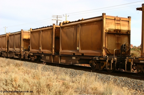 060531 4987
West Kalgoorlie, AQNY 32197 one of sixty two waggons built by Goninan WA in 1998 as WQN type for Murrin Murrin container traffic, with sulphur skips S22 and S10 with original door and sliding tarpaulins.
Keywords: AQNY-type;AQNY32197;Goninan-WA;WQN-type;