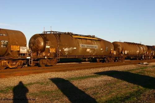 060603 5263 ATJY531J
Midland, ATJY 531 diesel fuel tank waggon built by Comeng NSW in 1971 for AMPOL, the same as a sister tank built at the same time for Caltex both as WJJ type two compartment two dome. Seen here in service with Caltex. 91,000 litres now single compartment.
Keywords: ATJY-type;ATJY531;Comeng-NSW;WJJ-type;