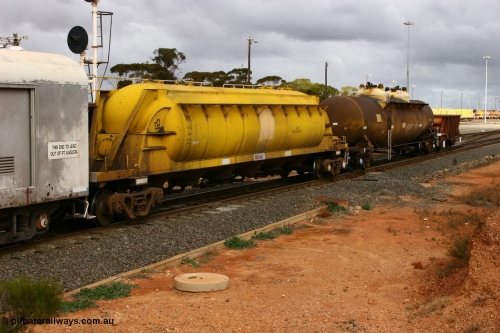 070528 9295
West Kalgoorlie, WN 5##, pneumatic discharge nickel concentrate waggon, one of thirty built by AE Goodwin NSW as WN type in 1970 for WMC.
Keywords: WN-type;AE-Goodwin;