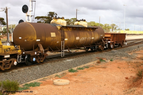 070528 9296
West Kalgoorlie, ATTY 30672 fuel tanker, one of five built by AE Goodwin NSW in 1970 as WST class, recoded to WSTY and then ATTY. 78600 litre capacity.
Keywords: ATTY-type;ATTY30672;AE-Goodwin;WST-type;WSTY-type;