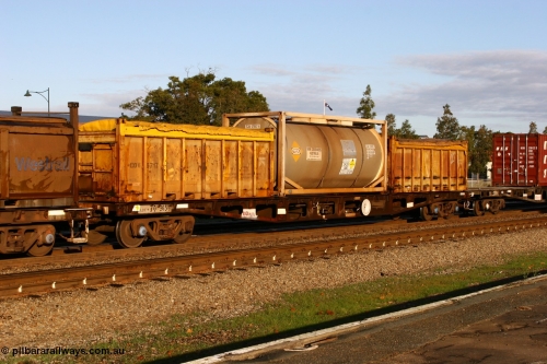070609 0182
Midland, AQCY 30365 container waggon, one of one hundred and sixty one units built by Tomlinson Steel WA in 1969-70 as WFX type, recoded to WQCX in 1980, loaded with two Westrail COB type 20' tarp top containers COB 5717 and COB 5711 with 20' ISO Tank Containers Australia tanktainer TCAU 121003 for ammonium nitrate emulsion.
Keywords: AQCY-type;AQCY30365;Tomlinson-Steel-WA;WFX-type;WQCX-type;