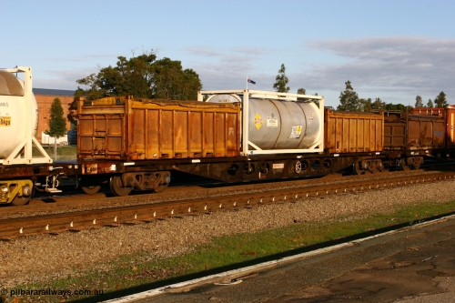 070609 0183
Midland, AQBY 30125 75' flat waggon, one of six built by Comeng NSW in 1970 as WFCX type flat waggon, recoded to WQBX in 1980. Loaded with two Westrail 20' COB type tarp top containers COB 5811 and COB 5829 and 20' ISO Tank Containers Australia tanktainer TCAU 121004 for ammonium nitrate emulsion.
Keywords: AQBY-type;AQBY30125;Comeng-NSW;WFCX-type;WQBX-type;