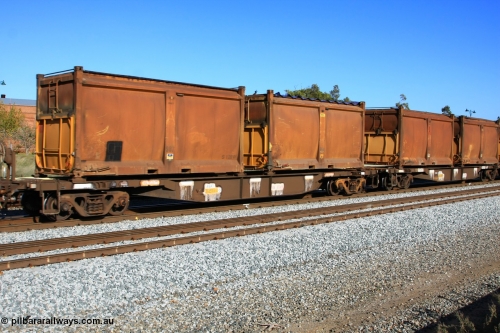 100608 9720
Midland, AQNY 32173, one of sixty two waggons built by Goninan WA in 1998 as WQN type for Murrin Murrin container traffic, with sulphur skips S128W with replacement door and roll top tarpaulin and S132W with replacement door and replaced blue sliding tarpaulin, on train 2430 empty Malcolm freighter.
Keywords: AQNY-type;AQNY32173;Goninan-WA;WQN-type;