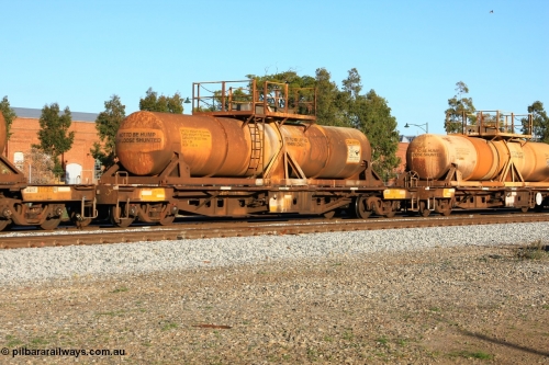 100609 09927
Midland, AQHY 30101 with sulphuric acid tank CSA 0070, originally built by the WAGR Midland Workshops in 1964/66 as a WF type flat waggon, then in 1997, following several recodes and modifications, was one of seventy five waggons converted to the WQH type to carry CSA sulphuric acid tanks between Hampton/Kalgoorlie and Perth/Kwinana.
Keywords: AQHY-type;AQHY30101;WAGR-Midland-WS;WF-type;WFDY-type;WFDF-type;RFDF-type;WQH-type;