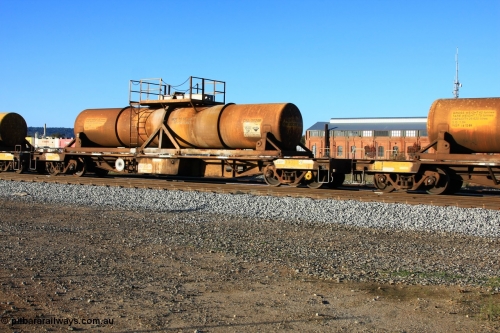 100609 09938
Midland, AQHY 30022 with sulphuric acid tank CSA 0028, originally built by the WAGR Midland Workshops in 1964/66 as a WF type flat waggon, then in 1997, following several recodes and modifications, was one of seventy five waggons converted to the WQH to carry CSA sulphuric acid tanks between Hampton/Kalgoorlie and Perth/Kwinana.
Keywords: AQHY-type;AQHY30022;WAGR-Midland-WS;WF-type;WMA-type;WFDY-type;WFDF-type;RFDF-type;WQH-type;