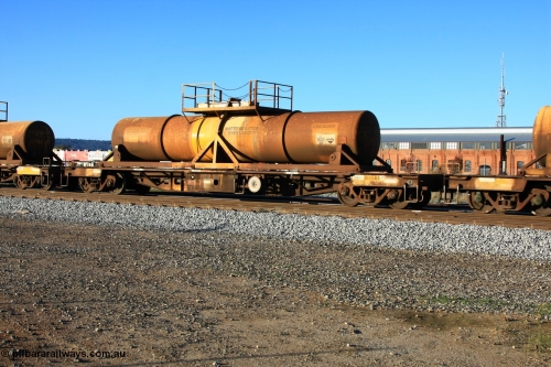 100609 09943
Midland, AQHY 30064 with sulphuric acid tank CSA 0030, originally built by the WAGR Midland Workshops in 1964/66 as a WF type flat waggon, then in 1997, following several recodes and modifications, was one of seventy five waggons converted to the WQH to carry CSA sulphuric acid tanks between Hampton/Kalgoorlie and Perth/Kwinana.
Keywords: AQHY-type;AQHY30064;WAGR-Midland-WS;WF-type;WFDY-type;WFDF-type;RFDF-type;WQH-type;
