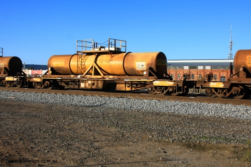 100609 09945
Midland, AQHY 30098 with sulphuric acid tank CSA 0065, originally built by the WAGR Midland Workshops in 1964/66 as a WF type flat waggon, then in 1997, following several recodes and modifications, was one of seventy five waggons converted to the WQH to carry CSA sulphuric acid tanks between Hampton/Kalgoorlie and Perth/Kwinana.
Keywords: AQHY-type;AQHY30098;WAGR-Midland-WS;WF-type;WMA-type;WFW-type;WFDY-type;WFDF-type;RFDF-type;WQH-type;