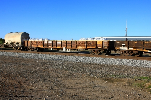 100609 09949
Midland, AOXY 33221, converted to carry nickel matte bulk bags, in WGL traffic. Built by WAGR Midland Workshops in 1973 as part of a batch of twenty five WGX type open waggons, in 1981 to WOAX, then AOAY type.
Keywords: AOXY-type;AOXY33221;WAGR-Midland-WS;WGX-type;WOAX-type;