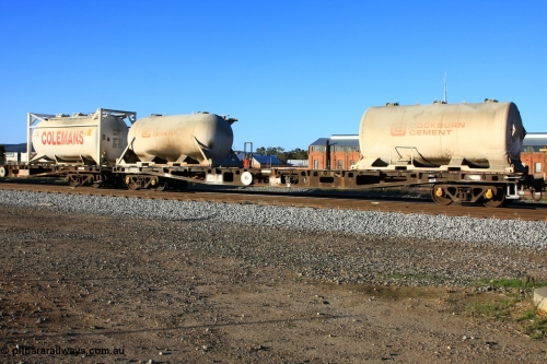 100609 09950
Midland, AQWY 30214 container waggon, originally one of forty five built by WAGR Midland Workshops in 1974 as WFX type, to WQCX in 1980. Loaded with two empty Cockburn Cement lime pressurised tanktainers.
Keywords: AQWY-type;AQWY30214;WAGR-Midland-WS;WFX-type;WQCX-type;AQCY-type;