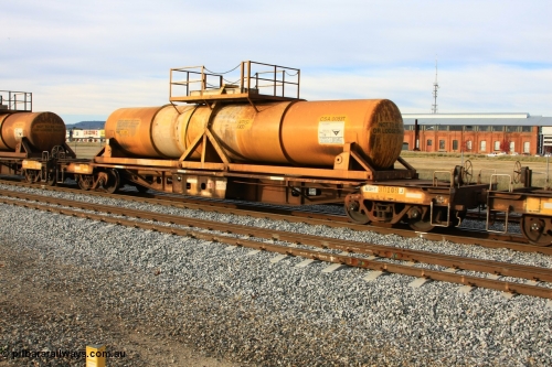 100611 0316
Midland, AQHY 30109 with sulphuric acid tank CSA 0053, originally built by the WAGR Midland Workshops in 1964/66 at WF type flat waggons, then following several codes and modifications in 1997 seventy five were converted to WQH to carry CSA sulphuric acid tanks between Hampton/Kalgoorlie and Perth/Kwinana.
Keywords: AQHY-type;AQHY30109;WAGR-Midland-WS;WF-type;WFDY-type;WFDF-type;WQH-type;