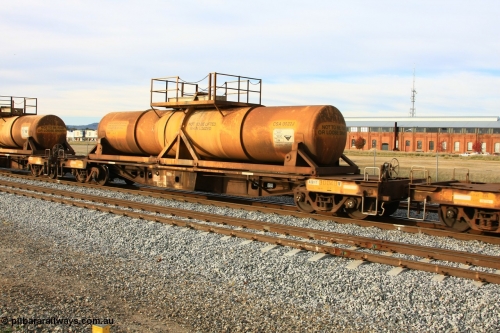 100611 0317
Midland, AQHY 30040 with sulphuric acid tank CSA 0022, originally built by the WAGR Midland Workshops in 1964/66 at WF type flat waggons, then following several codes and modifications in 1997 seventy five were converted to WQH to carry CSA sulphuric acid tanks between Hampton/Kalgoorlie and Perth/Kwinana.
Keywords: AQHY-type;AQHY30040;WAGR-Midland-WS;WF-type;WFDY-type;WFDF-type;WQH-type;