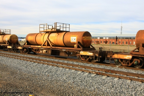 100611 0319
Midland, AQHY 30079 with sulphuric acid tank CSA 0054, originally built by the WAGR Midland Workshops in 1964/66 at WF type flat waggons, then following several codes and modifications in 1997 seventy five were converted to WQH to carry CSA sulphuric acid tanks between Hampton/Kalgoorlie and Perth/Kwinana.
Keywords: AQHY-type;AQHY30079;WAGR-Midland-WS;WF-type;WFDY-type;WFDF-type;RFDF-type;WQH-type;