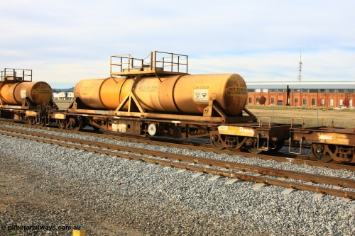 100611 0320
Midland, AQHY 30025 with sulphuric acid tank CSA 0023, originally built by the WAGR Midland Workshops in 1964/66 at WF type flat waggons, then following several codes and modifications in 1997 seventy five were converted to WQH to carry CSA sulphuric acid tanks between Hampton/Kalgoorlie and Perth/Kwinana.
Keywords: AQHY-type;AQHY30025;WAGR-Midland-WS;WF-type;WMA-type;WFDY-type;WFDF-type;RFDF-type;WQH-type;