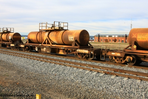 100611 0330
Midland, AQHY 30061 with sulphuric acid tank CSA 0026, originally built by the WAGR Midland Workshops in 1964/66 at WF type flat waggons, then following several codes and modifications in 1997 seventy five were converted to WQH to carry CSA sulphuric acid tanks between Hampton/Kalgoorlie and Perth/Kwinana.
Keywords: AQHY-type;AQHY30061;WAGR-Midland-WS;WF-type;WFDY-type;WFDF-type;RFDF-type;WQH-type;