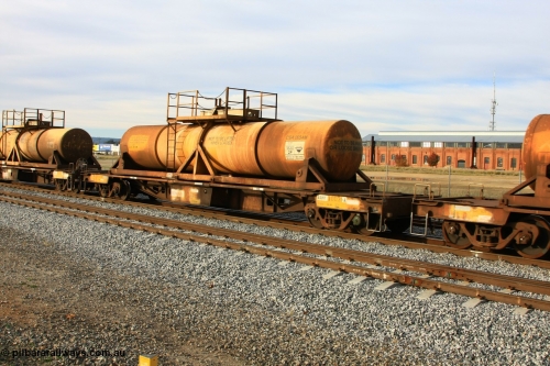 100611 0332
Midland, AQHY 30031 with sulphuric acid tank CSA 0034, originally built by the WAGR Midland Workshops in 1964/66 at WF type flat waggons, then following several codes and modifications in 1997 seventy five were converted to WQH to carry CSA sulphuric acid tanks between Hampton/Kalgoorlie and Perth/Kwinana.
Keywords: AQHY-type;AQHY30031;WAGR-Midland-WS;WF-type;WFW-type;WFDY-type;WFDF-type;RFDF-type;WQH-type;