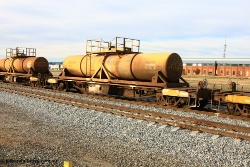 100611 0333
Midland, AQHY 30102 with sulphuric acid tank CSA 0001, originally built by the WAGR Midland Workshops in 1964/66 at WF type flat waggons, then following several codes and modifications in 1997 seventy five were converted to WQH to carry CSA sulphuric acid tanks between Hampton/Kalgoorlie and Perth/Kwinana.
Keywords: AQHY-type;AQHY30102;WAGR-Midland-WS;WF-type;WFDY-type;WFDF-type;RFDF-type;WQH-type;