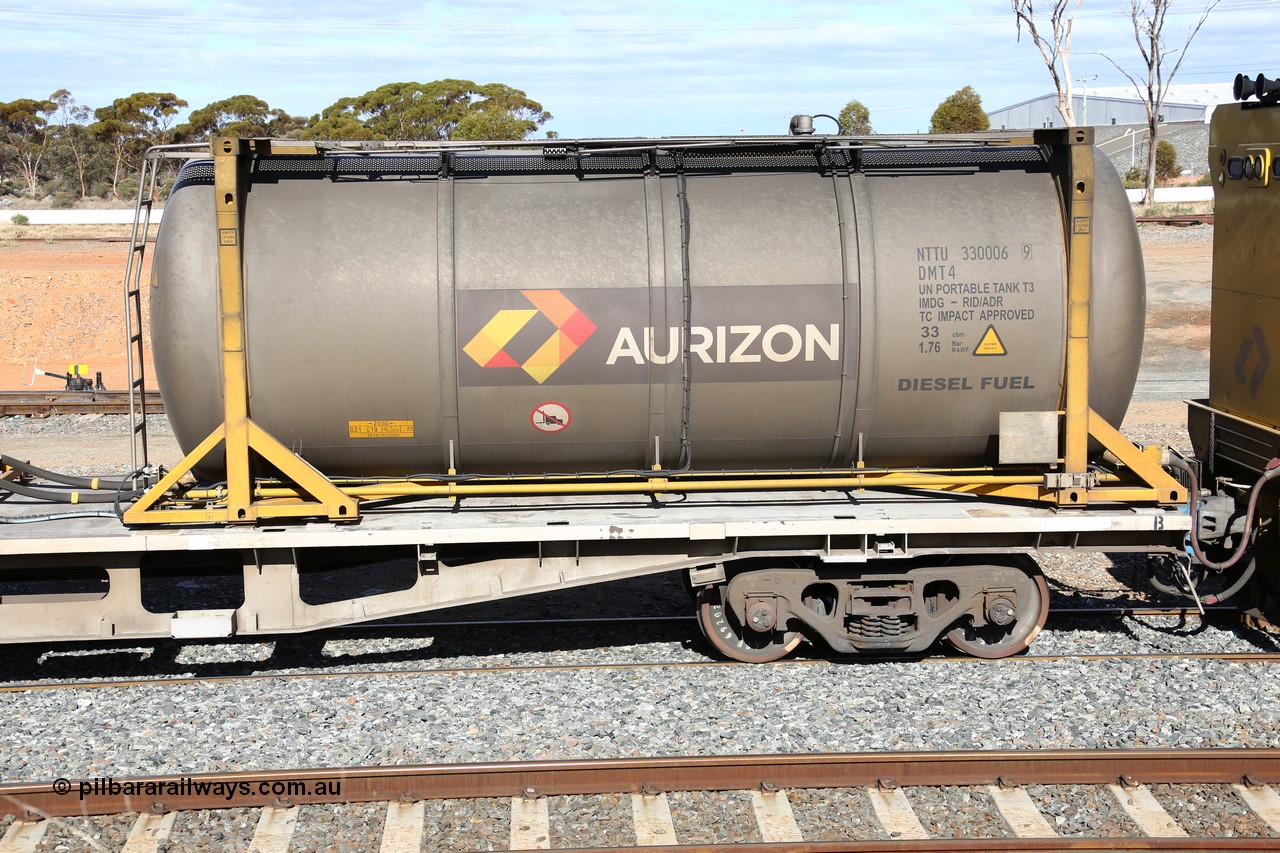 160525 4947
West Kalgoorlie, Aurizon intermodal train 2MP1. Inline fuelling waggon QQFY 4271 B end with 30' diesel fuel tanktainer from Nantong Tank Container Company, NTTU 330006, these tanks have a 30800 litre capacity.
Keywords: QQFY-type;QQFY4271;Perry-Engineering-SA;RMX-type;AQMX-type;AQMY-type;RQMY-type;