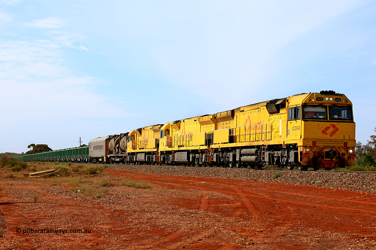 231020 8139
Parkeston, Aurizon's mineral sand service 4UP1 arrives behind ACD 6049, 6025 and ACD 6048 with 114 waggons for 9296 tonnes and 1600 metres. 20th of October 2023.
