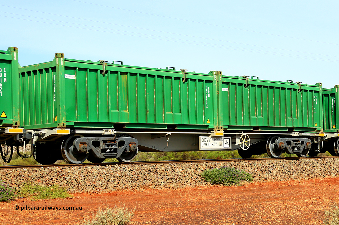 231020 8148
Parkeston, QQYY type 40' container waggon QQYY 57905 one of five hundred ordered by Aurizon and built by CRRC Yangtze Group of China in 2022. In service with two loaded 20' half height hard top 'rotainers' lettered CRM, for Cristal Mining before they were absorbed into Tronox, CRM 001196 with Tronox decal and CRM 000772 with Tronox decal, on Aurizon's Tronox mineral sands train 4UP1 from Ivanhoe / Broken Hill (NSW) to Kwinana (WA). 20th of October 2023.
Keywords: QQYY-type;QQYY57905;CRRC-Yangtze-Group-China;