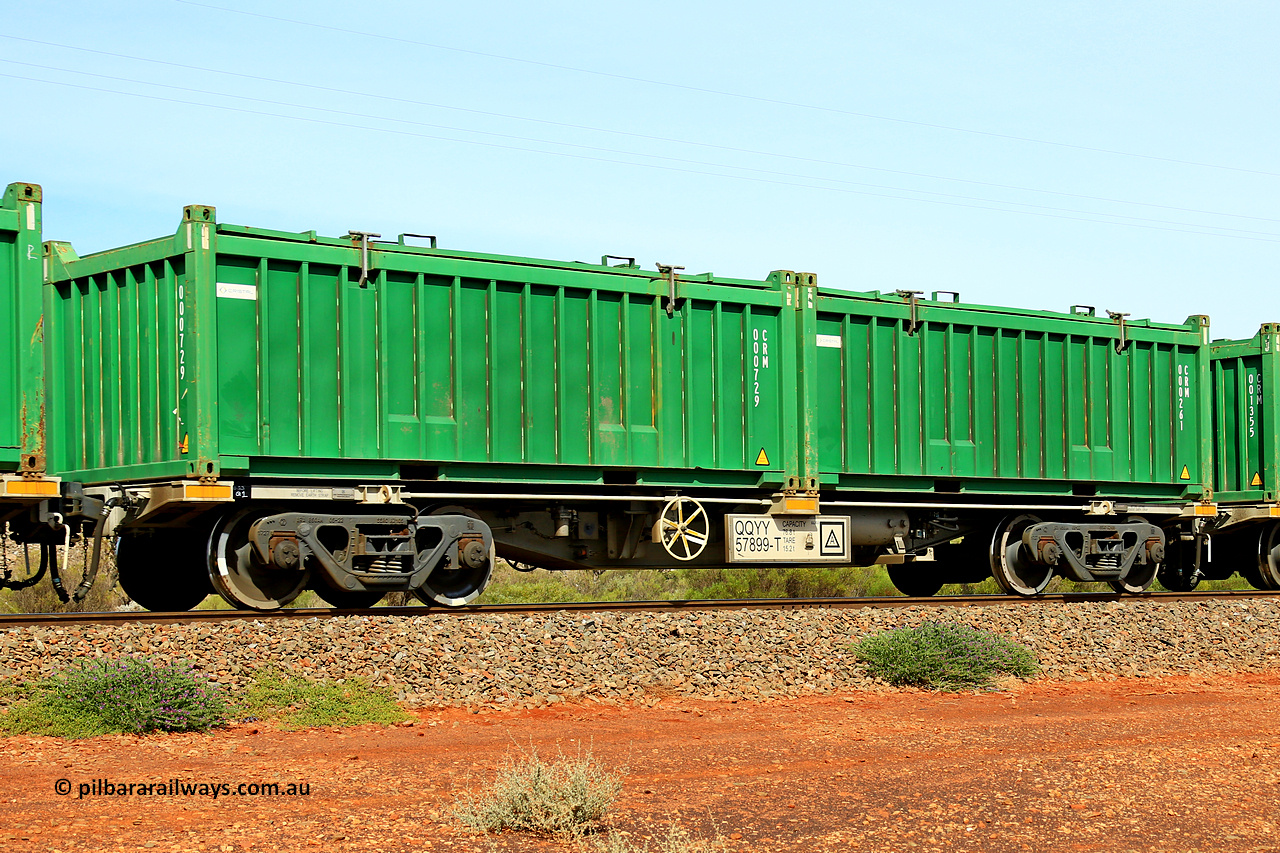 231020 8161
Parkeston, QQYY type 40' container waggon QQYY 57899 one of five hundred ordered by Aurizon and built by CRRC Yangtze Group of China in 2022. In service with two loaded 20' half height hard top 'rotainers' lettered CRM, for Cristal Mining before they were absorbed into Tronox, CRM 000261 with Cristal decal and CRM 000729 with Cristal decal, on Aurizon's Tronox mineral sands train 4UP1 from Ivanhoe / Broken Hill (NSW) to Kwinana (WA). 20th of October 2023.
Keywords: QQYY-type;QQYY57899;CRRC-Yangtze-Group-China;