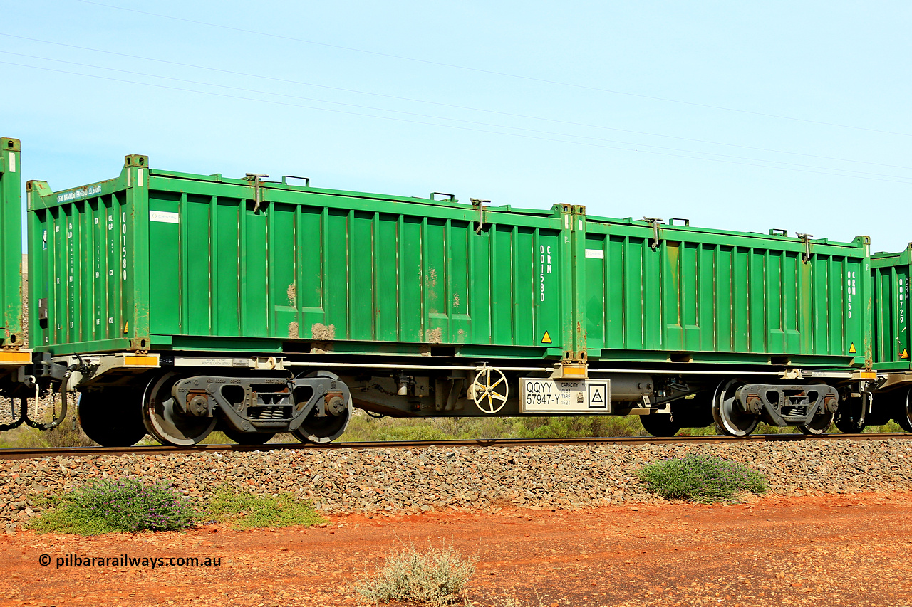 231020 8162
Parkeston, QQYY type 40' container waggon QQYY 57947 one of five hundred ordered by Aurizon and built by CRRC Yangtze Group of China in 2022. In service with two loaded 20' half height hard top 'rotainers' lettered CRM, for Cristal Mining before they were absorbed into Tronox, CRM 000450 with Cristal decal and CRM 001580 with Cristal decal, on Aurizon's Tronox mineral sands train 4UP1 from Ivanhoe / Broken Hill (NSW) to Kwinana (WA). 20th of October 2023.
Keywords: QQYY-type;QQYY57947;CRRC-Yangtze-Group-China;