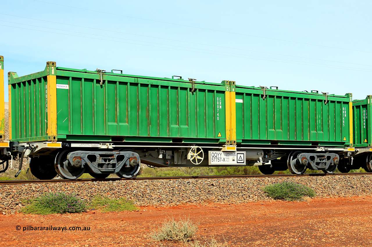 231020 8168
Parkeston, QQYY type 40' container waggon QQYY 57757 one of five hundred ordered by Aurizon and built by CRRC Yangtze Group of China in 2022. In service with two loaded 20' half height hard top 'rotainers' lettered CRM, for Cristal Mining before they were absorbed into Tronox, CRM 001405 with Cristal decal and yellow corner posts and CRM 000740 with Tronox decal and yellow corner posts, on Aurizon's Tronox mineral sands train 4UP1 from Ivanhoe / Broken Hill (NSW) to Kwinana (WA). 20th of October 2023.
Keywords: QQYY-type;QQYY57757;CRRC-Yangtze-Group-China;